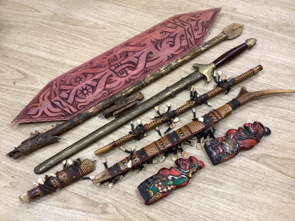 A group of Dayak Borneo tribal weapons and a Chinese sword